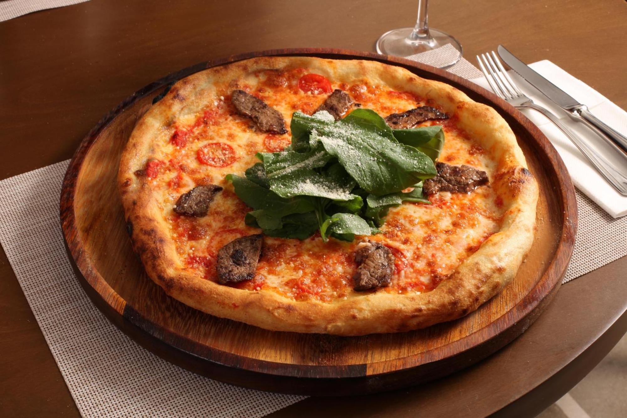 Bentley Hotel Bosphorus - Special Class Стамбул Экстерьер фото A pizza with sausage and arugula